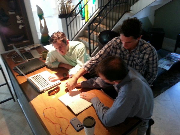 Chris Callahan, Nick Mohnacky and Chris Roog planning Startup Weekend
