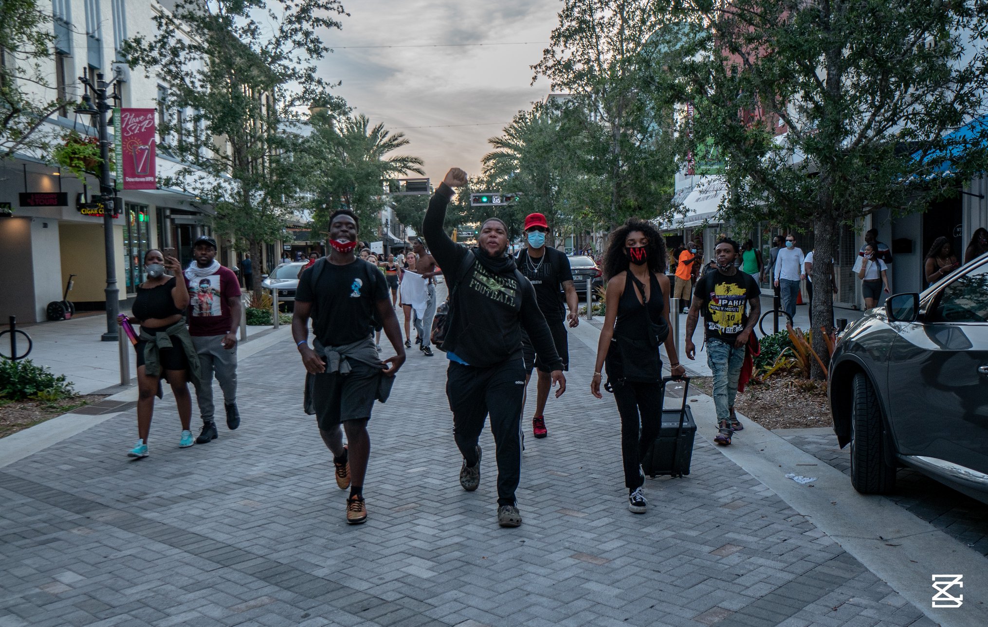 Protesters on Clematis Street (Photo by Zach Smith - Tweez Photography)